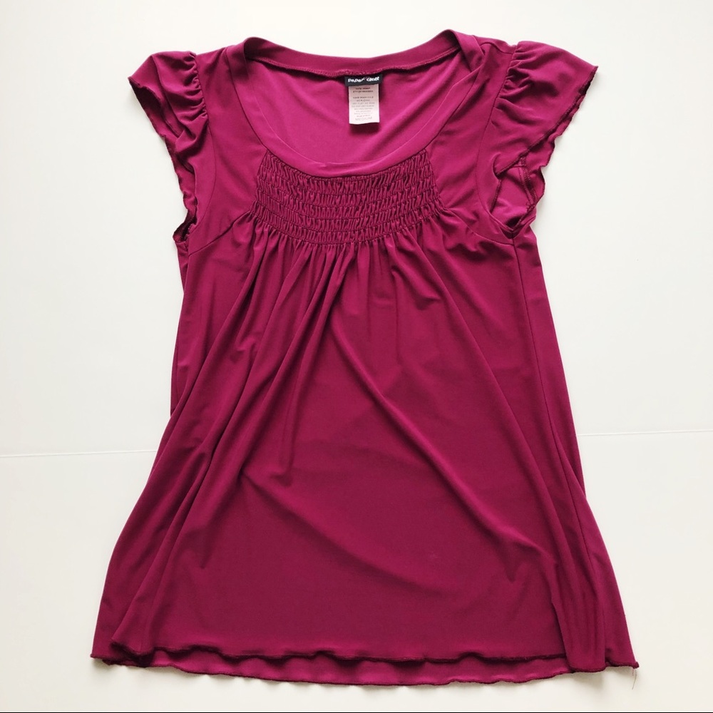 Magenta tunic with ruffle detail. Size medium